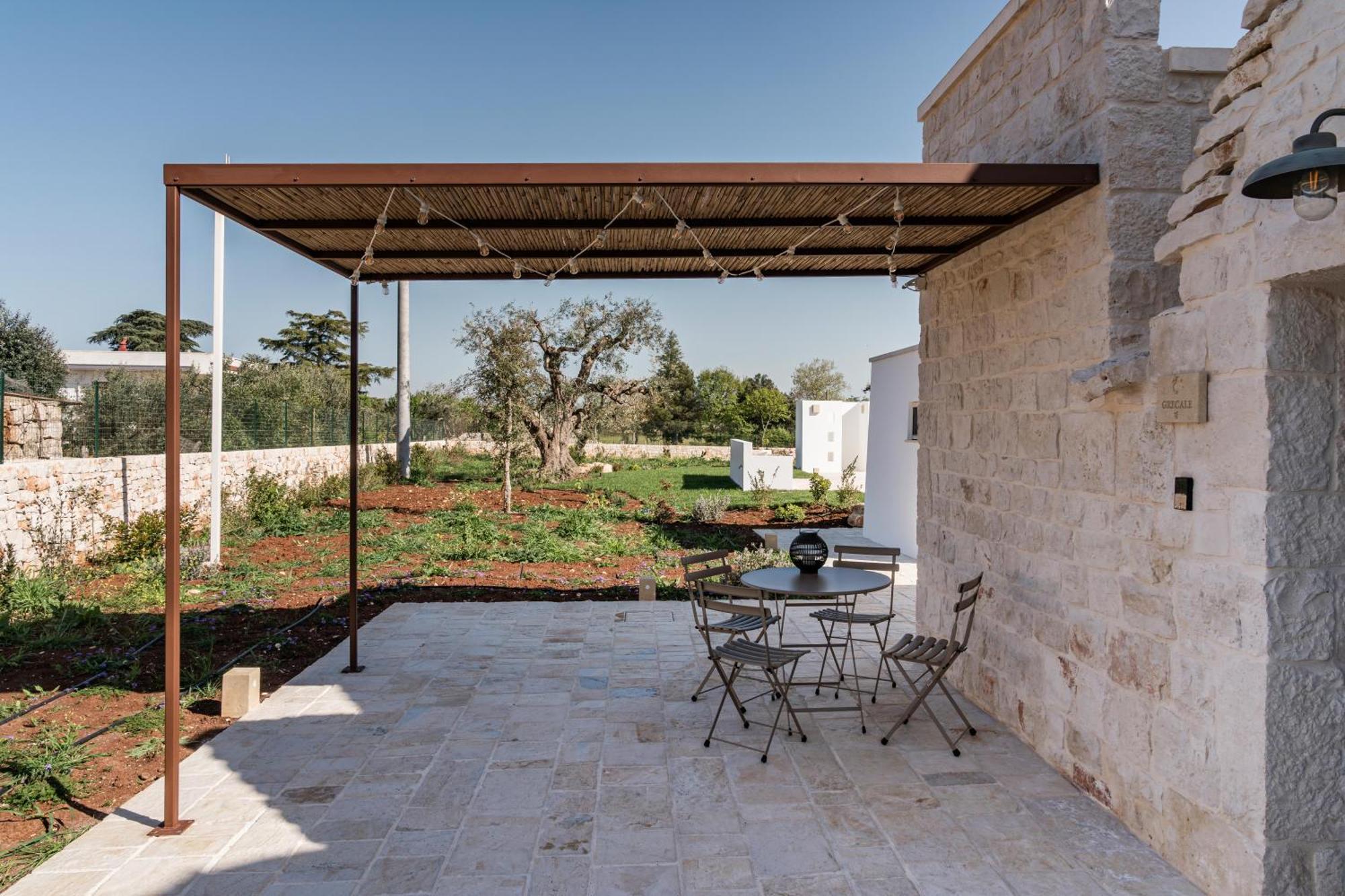 Trullo Jale - Boutique Apartments 奥斯图尼 客房 照片