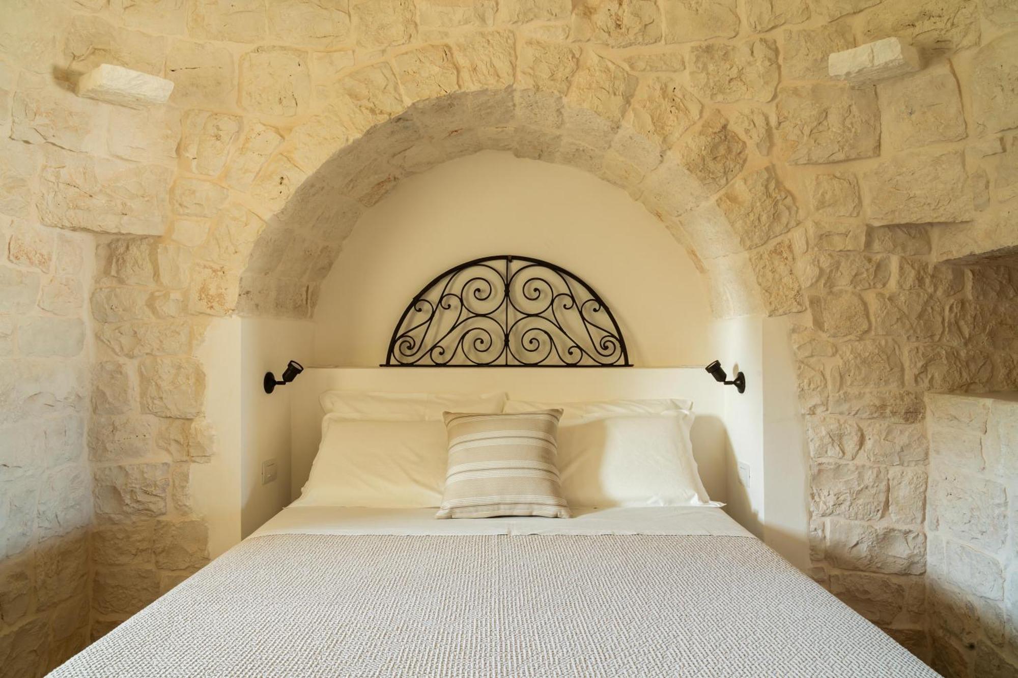 Trullo Jale - Boutique Apartments 奥斯图尼 客房 照片